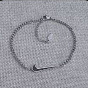 NIKE: Swoosh Bracelet